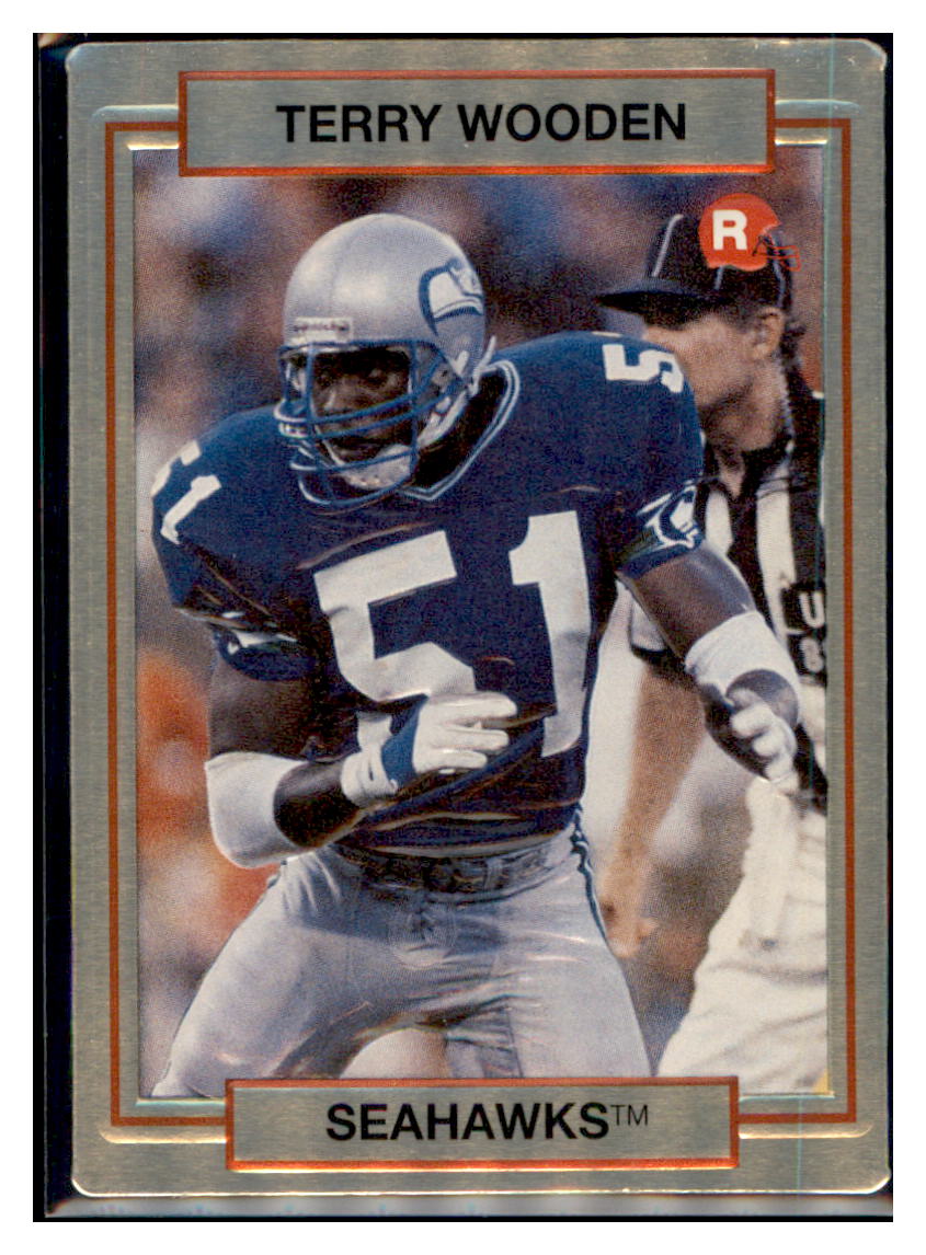 1990
Action Packed Rookie Update Terry Wooden
RC Seattle Seahawks Football Card VFBMA_1e simple Xclusive Collectibles