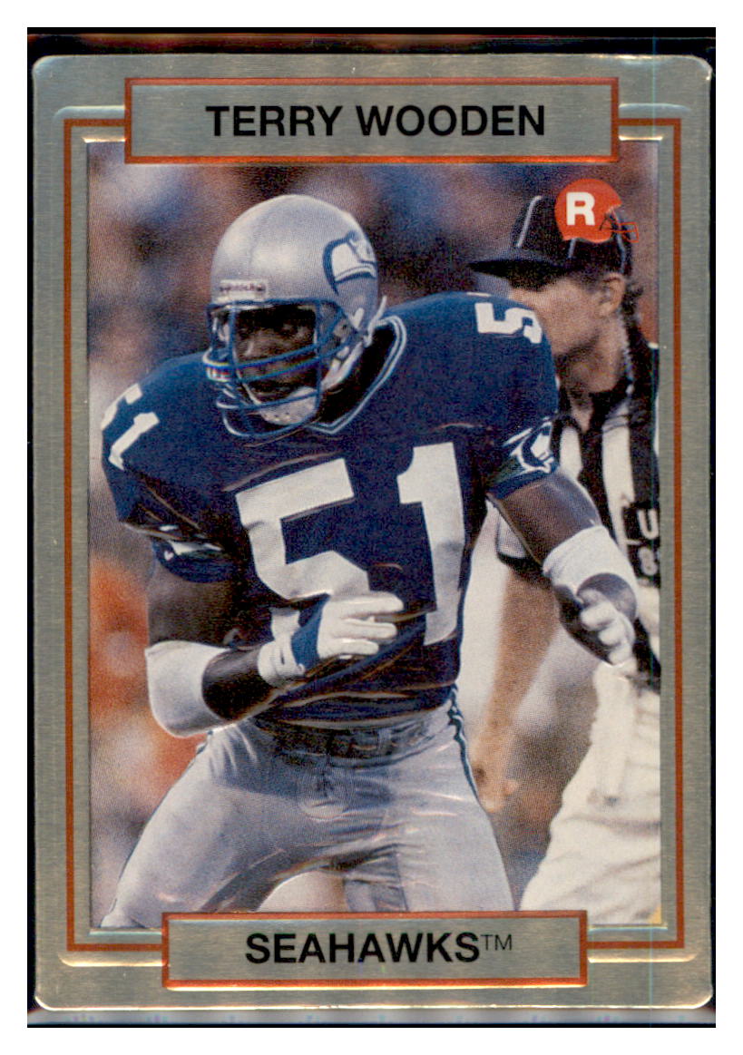 1990
Action Packed Rookie Update Terry Wooden
RC Seattle Seahawks Football Card VFBMA_1c simple Xclusive Collectibles