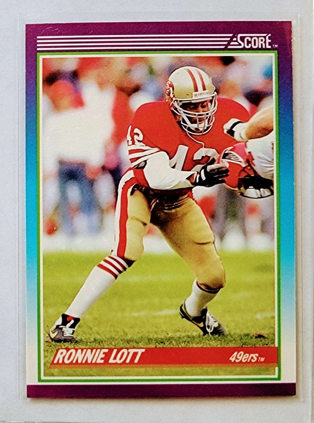 1990 Score Ronnie Lott Football Card AVM1 simple Xclusive Collectibles