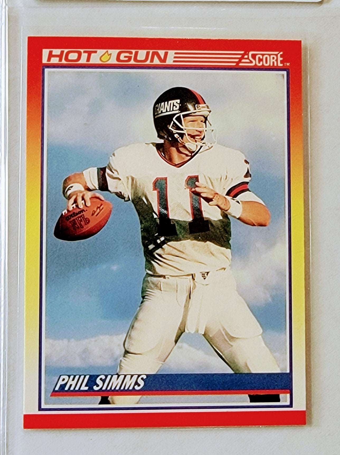 1990 Score Phil Simms Hot Guns Insert Football Card simple Xclusive Collectibles
