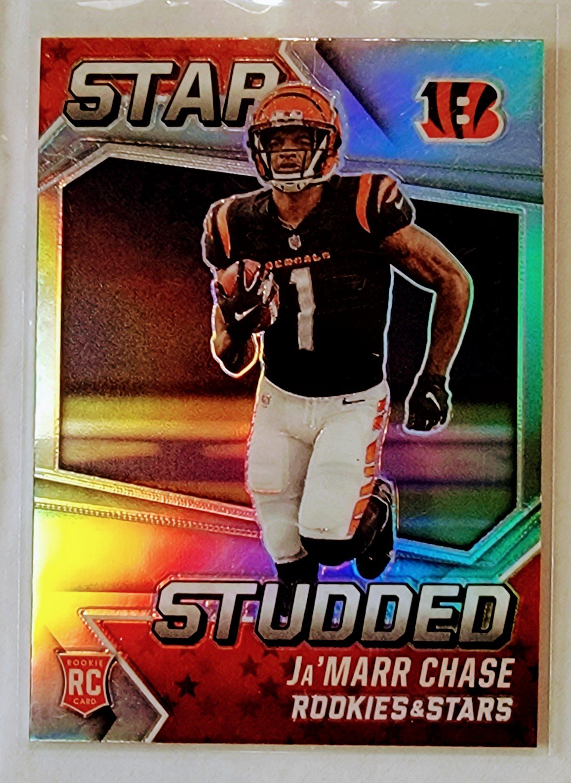 2021 Panini Rookies and Stars Ja'marr Chase Star Studded Silver Prizm Refractor Football Card AVM1 simple Xclusive Collectibles