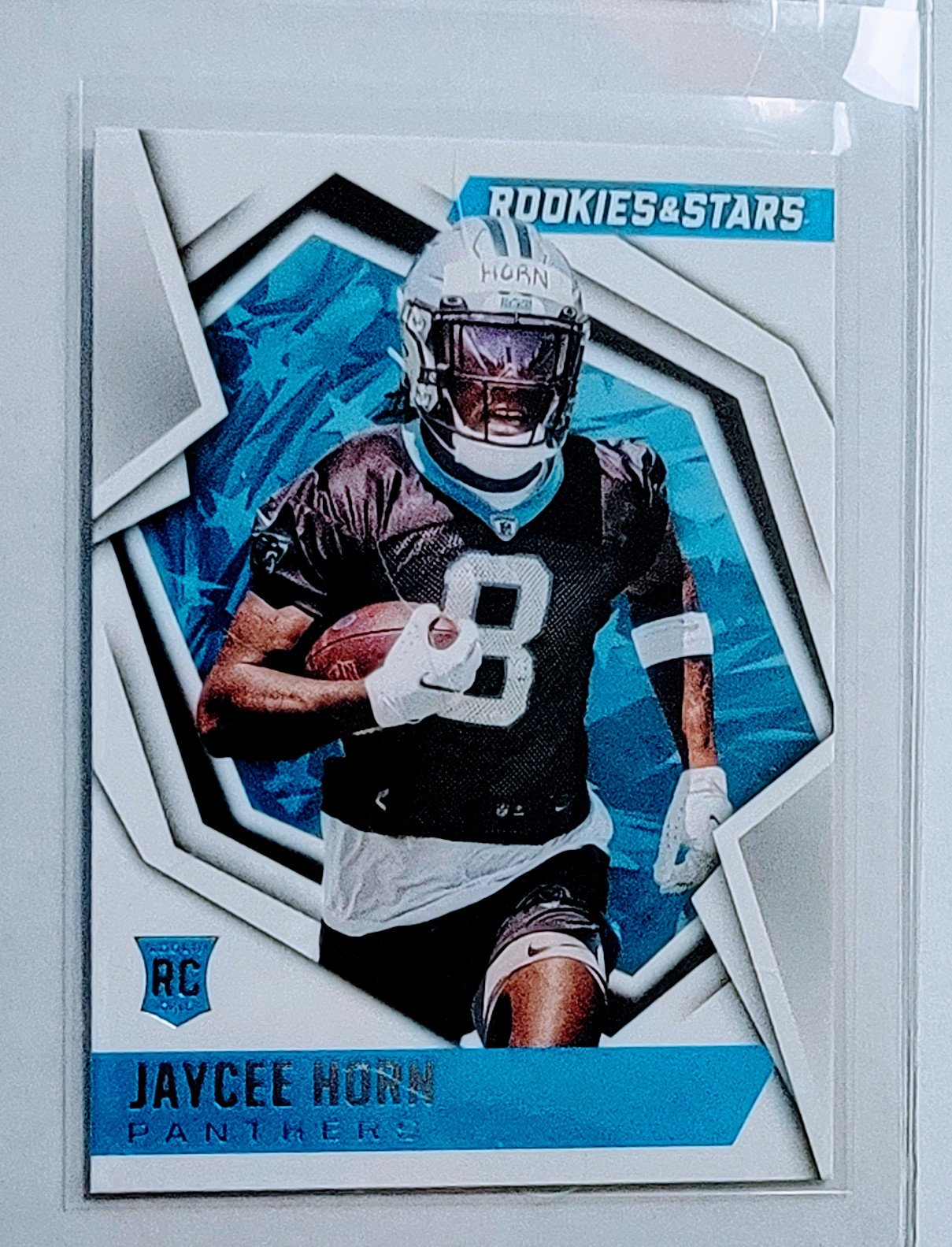 2021 Panini Rookies and Stars Jaycee Horn Rookie Football Card AVM1 simple Xclusive Collectibles