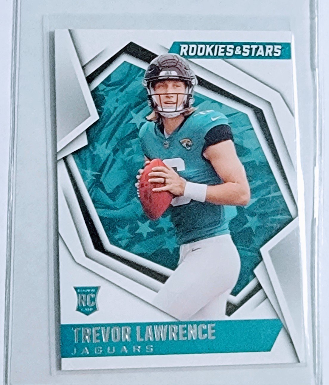 2021 Panini Rookies and Stars Trevor Lawrence Rookie Football Card AVM1 simple Xclusive Collectibles