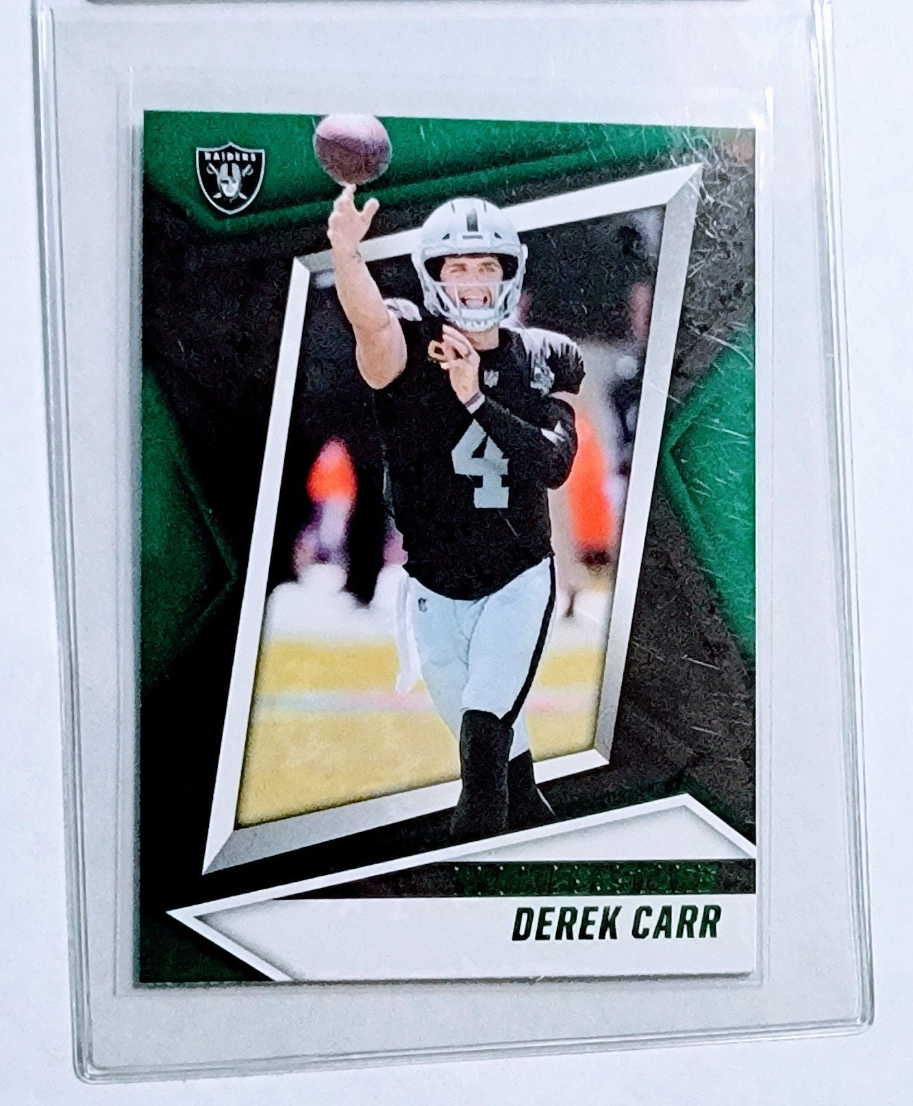 2021 Panini Rookies and Stars Derek Carr Green Football Card AVM1 simple Xclusive Collectibles