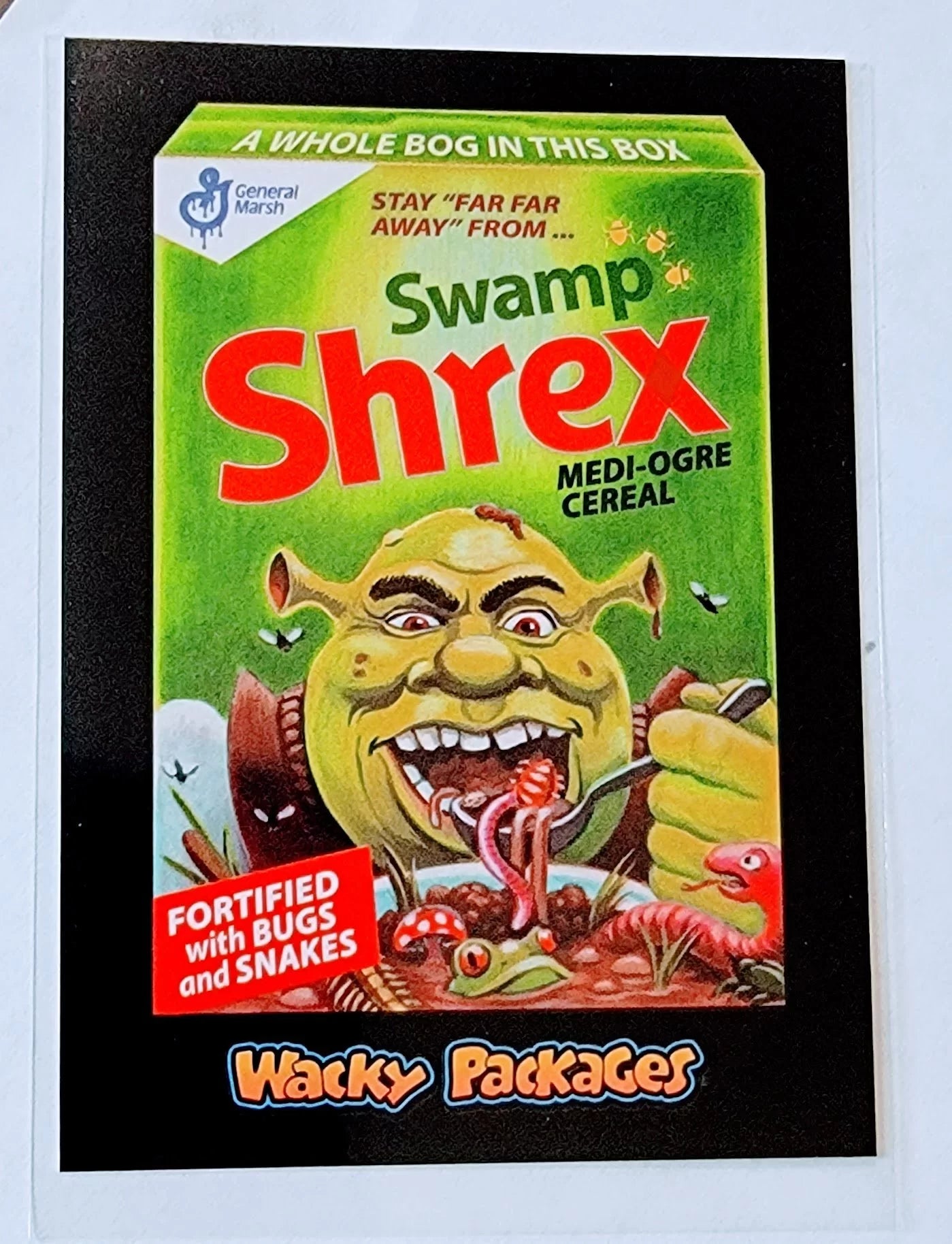 2017 Wacky Packages 50th Anniversary Swamp Shrex Medi-Ogre Cereal Sticker Trading Card MCSC1 simple Xclusive Collectibles