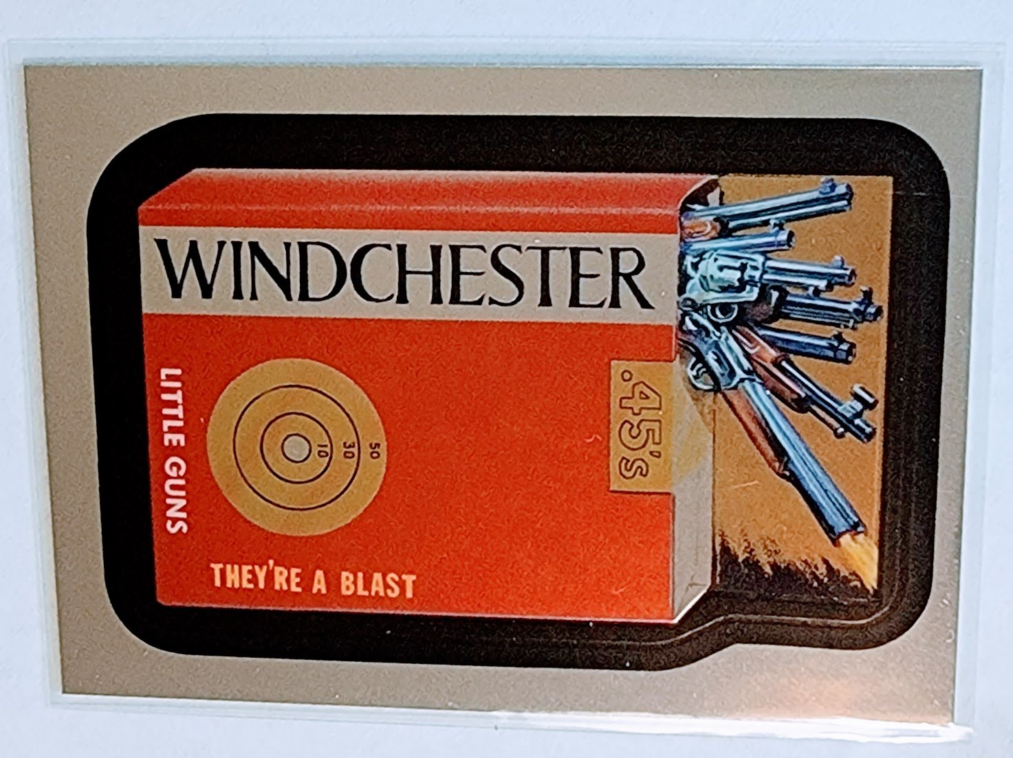 2014 Wacky Packages Chrome Winchester Little Guns Sticker Trading Card MCSC1 simple Xclusive Collectibles