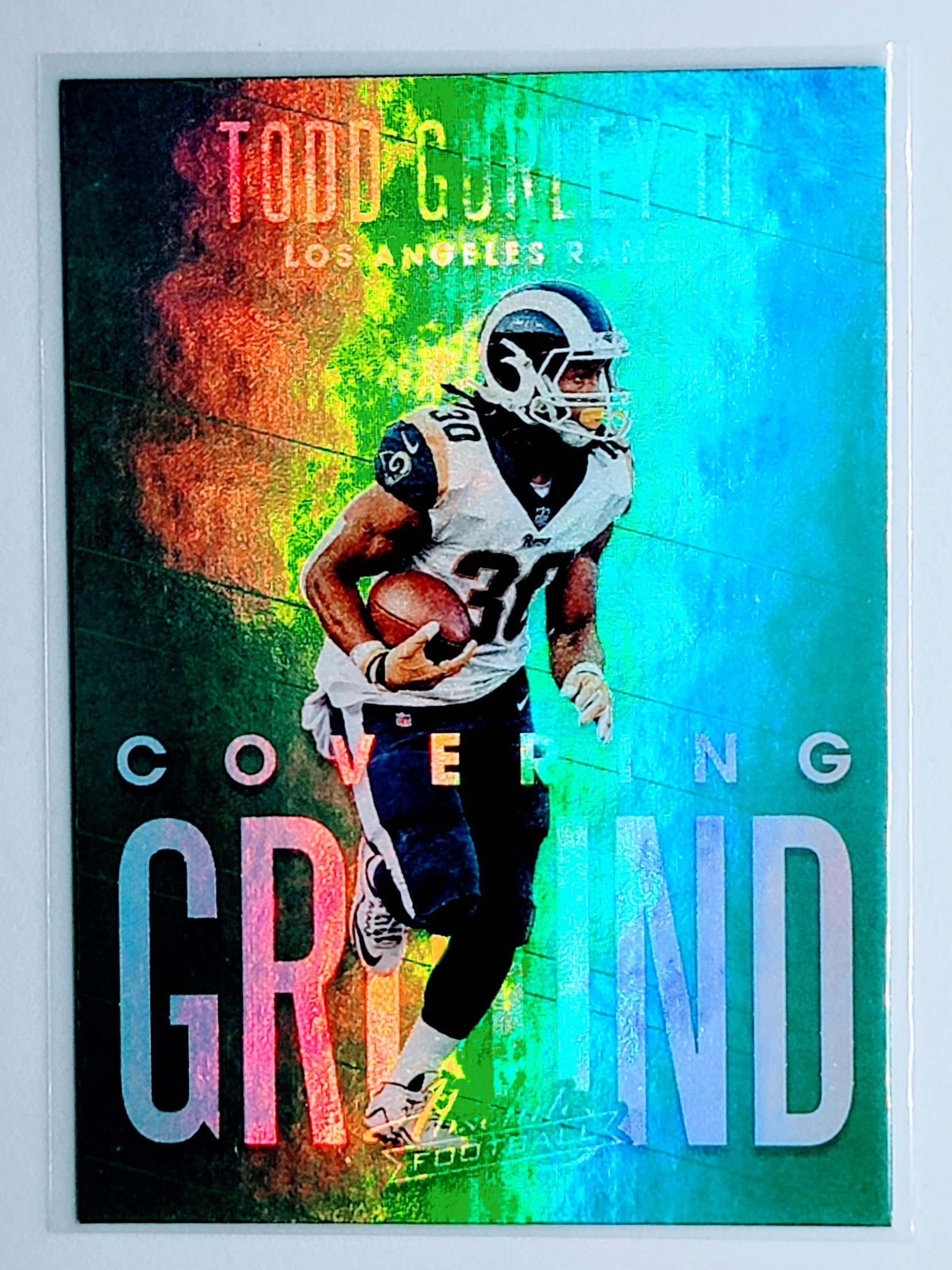 2018 Panini Absolute Todd
  Gurley II Covering Ground Spectrum Gold 
  Los Angeles Rams Football Card 
  TH1CB simple Xclusive Collectibles   