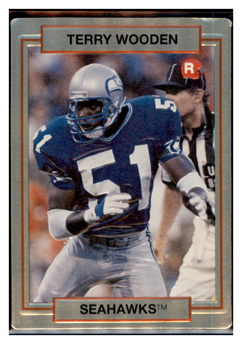 1990
  Action Packed Rookie Update Terry Wooden  
  RC Seattle Seahawks Football Card VFBMA_1c simple Xclusive Collectibles   