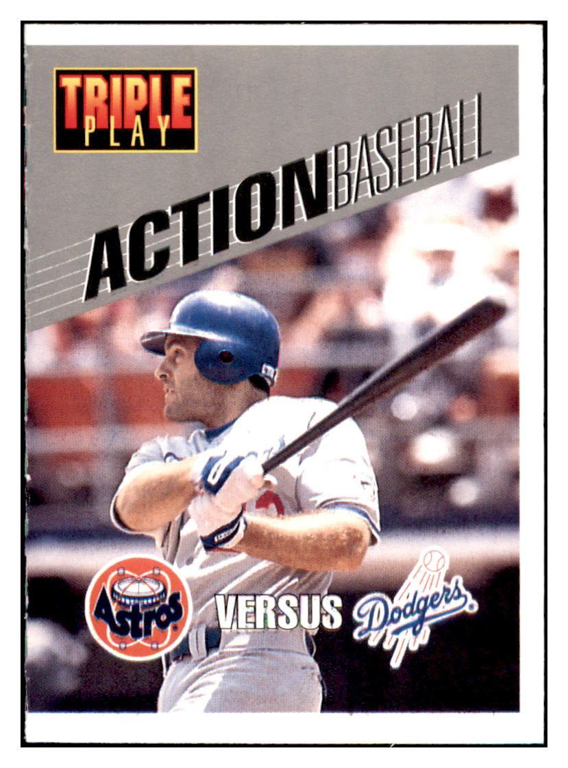 1993 Triple Play Eric Karros
  Action  Los Angeles Dodgers Baseball
  Card GMMGD simple Xclusive Collectibles   